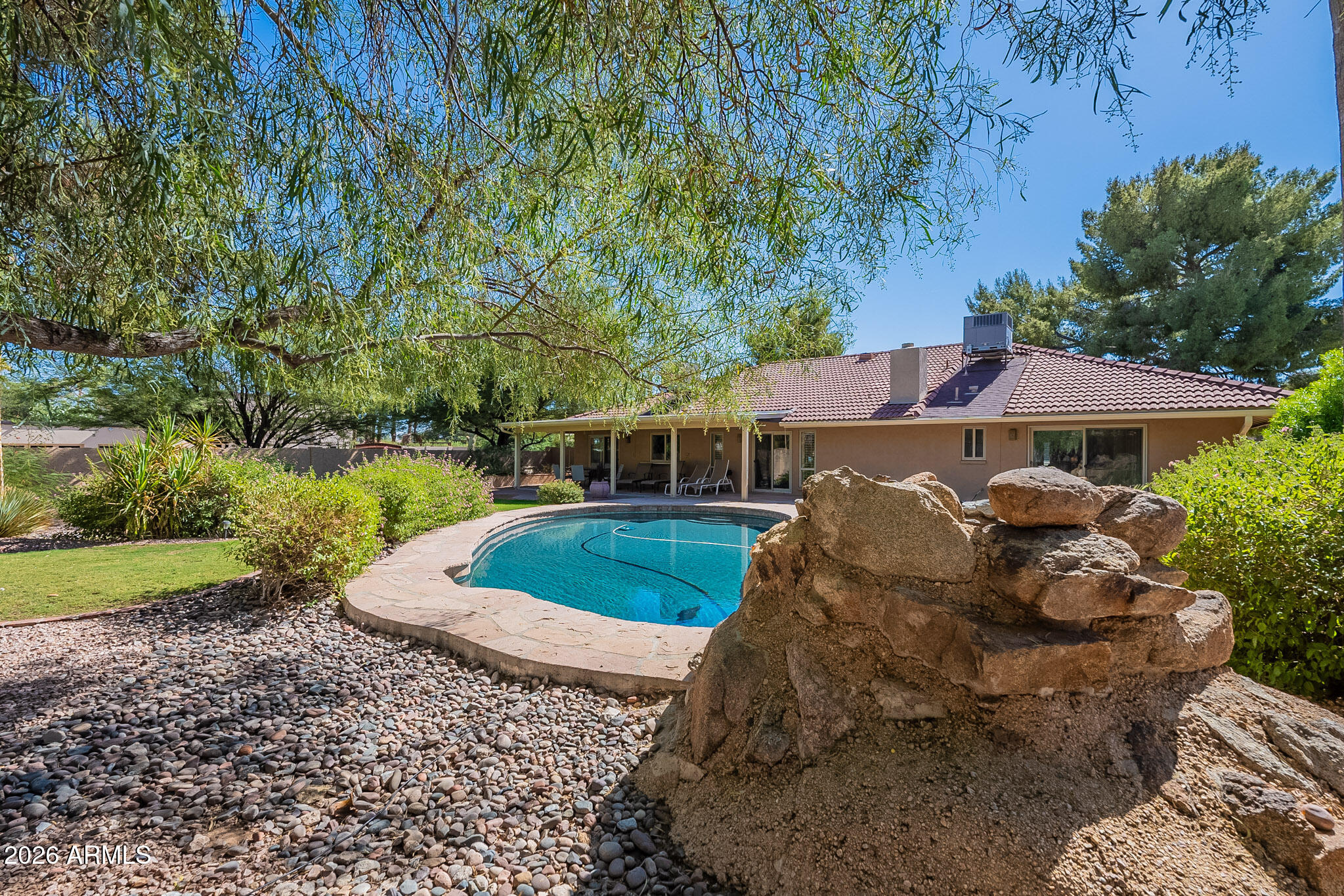 4226 East North Lane Phoenix, AZ 85028 - Photo 38 of 43 a front view of a house with a yard