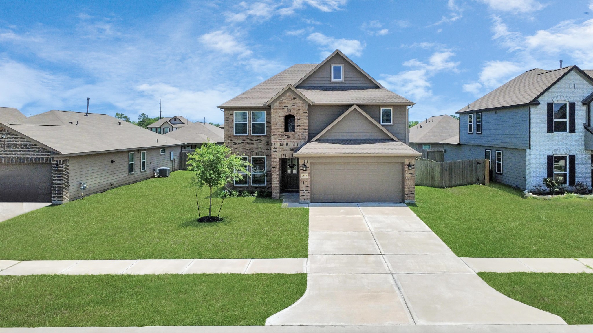 2643 Ridgeback Drive Rosenberg, TX 77471 - Photo 2 of 46 a front view of a house with a yard