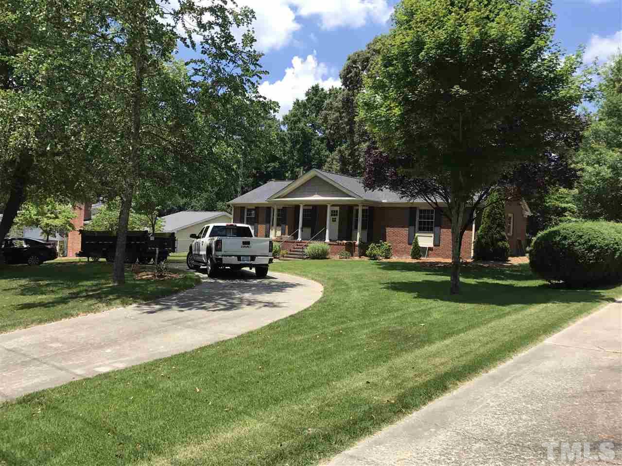 127 Crestview Road Raleigh, NC 27609 - Photo 1 of 9 a front view of a house with garden