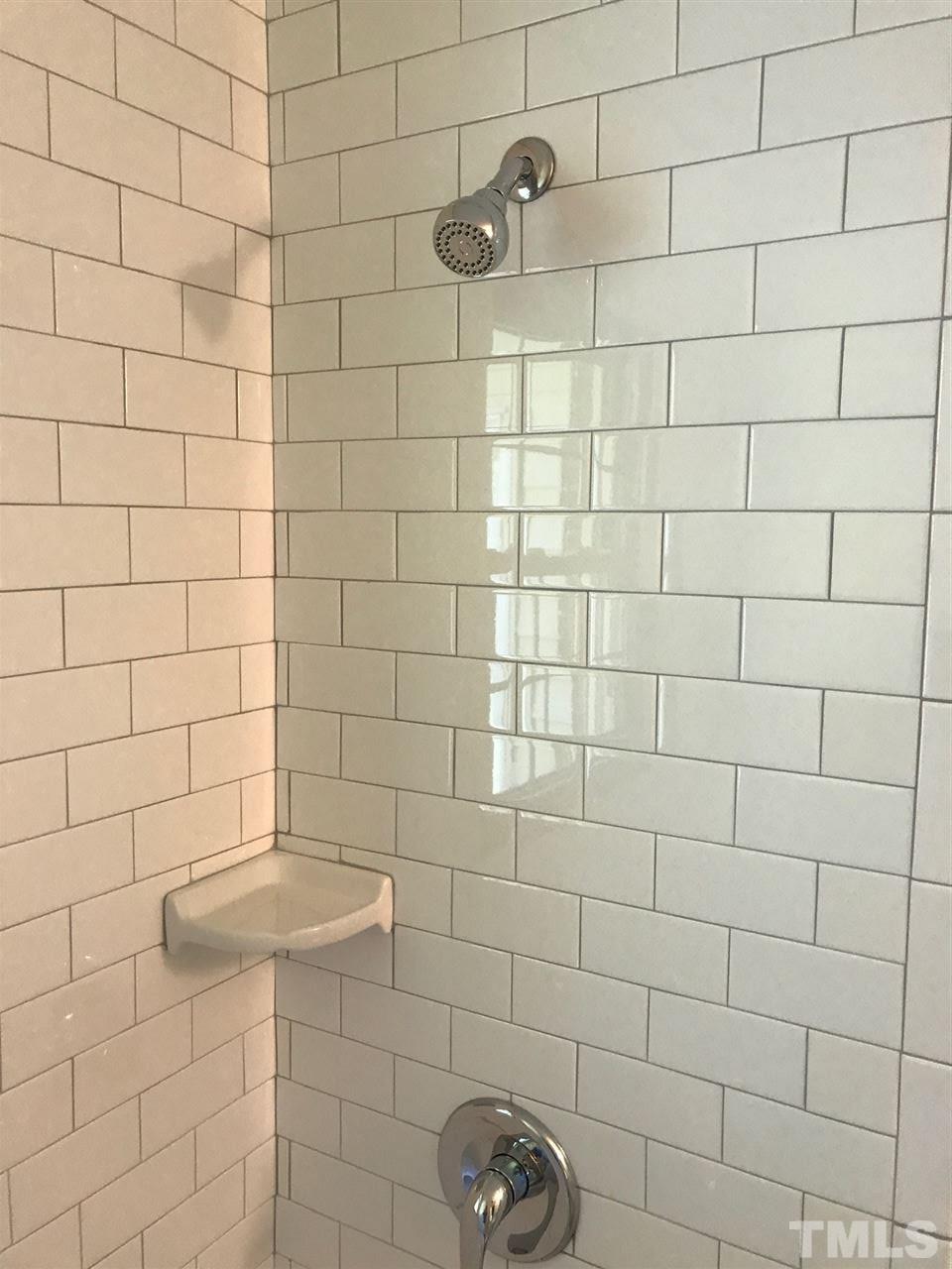 127 Crestview Road Raleigh, NC 27609 - Photo 4 of 9 a bathroom with a shower
