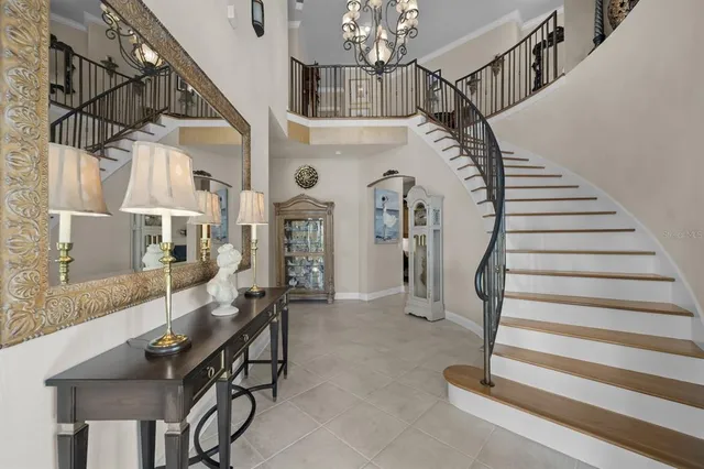 a view of a livingroom with furniture and a window