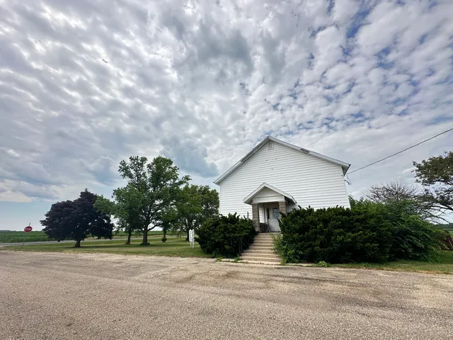 a house with trees in front of it