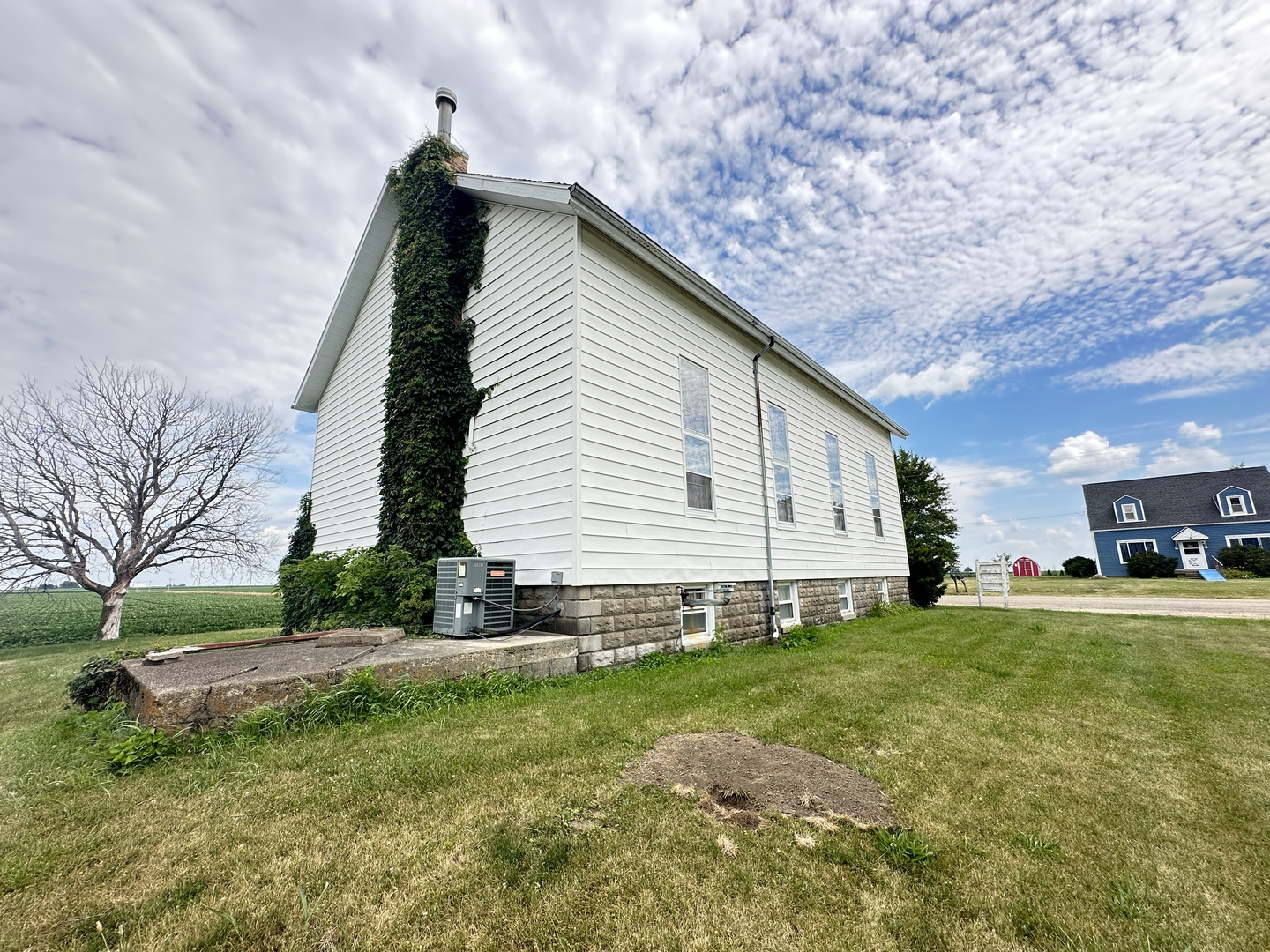 21027 Prairie Chapel Road Farmer City, IL 61842 - Photo 16 of 16 a view of a house with a yard