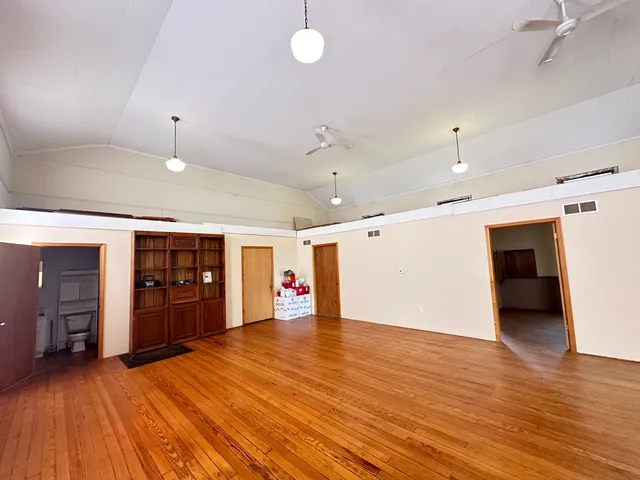 a view of a livingroom with furniture and window