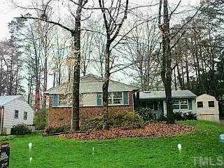4835 Radcliff Road Raleigh, NC 27609 - Photo 1 of 1 front view of a house with a yard
