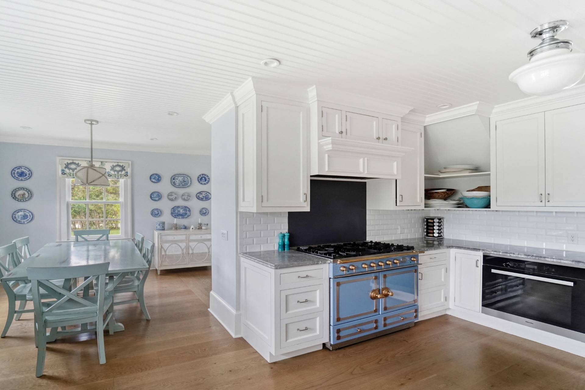 22 Oneck Road Westhampton Beach, NY 11978 - Photo 12 of 29 a kitchen with stainless steel appliances a stove a sink and a refrigerator
