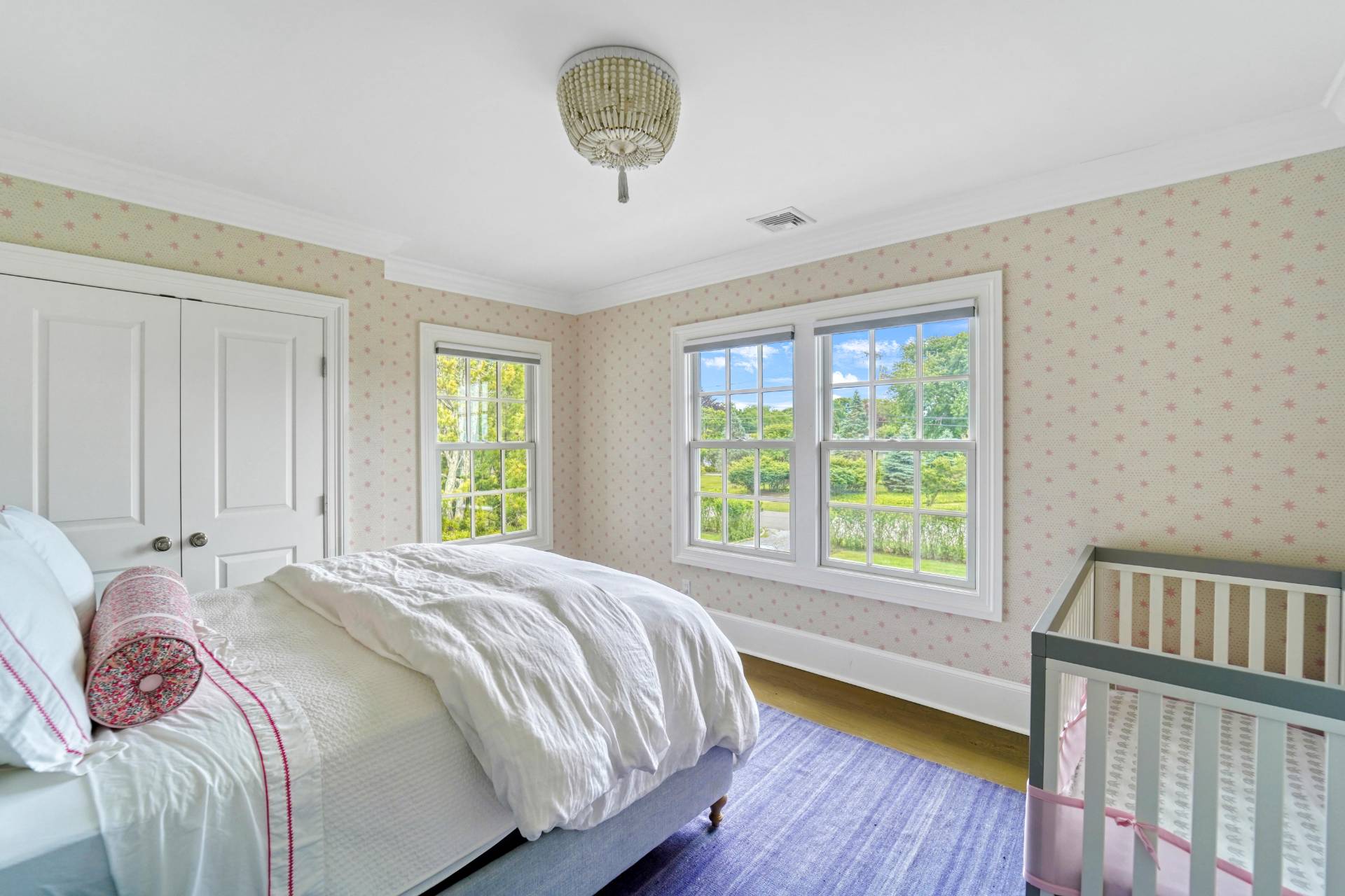 22 Oneck Road Westhampton Beach, NY 11978 - Photo 21 of 29 a bedroom with a bed and a window