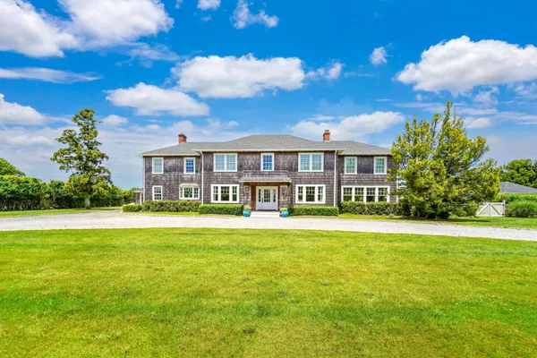 a view of a house with a swimming pool