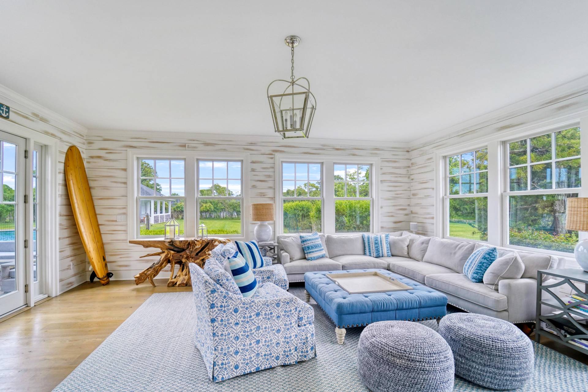 22 Oneck Road Westhampton Beach, NY 11978 - Photo 10 of 29 a living room with furniture and floor to ceiling windows