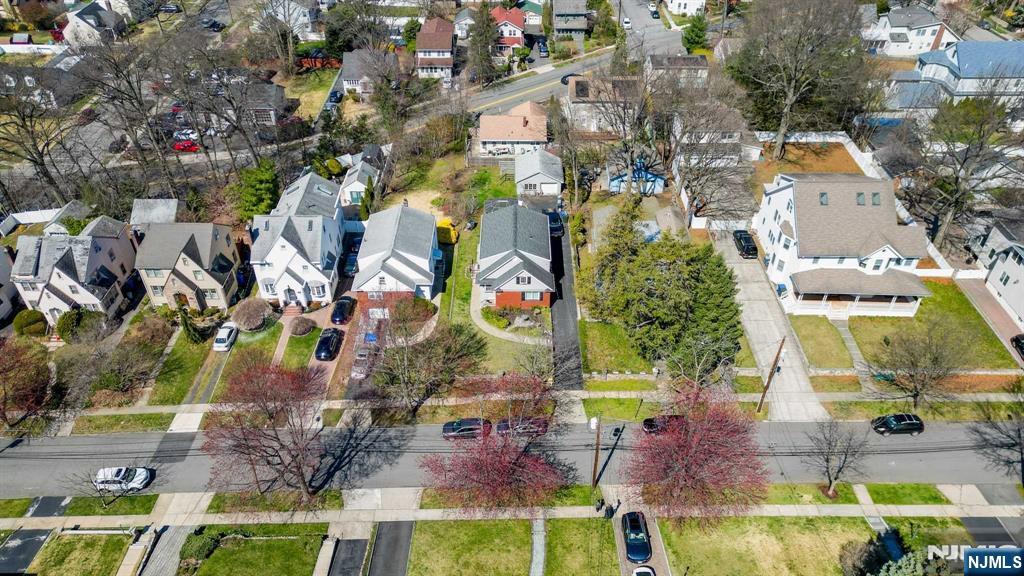 238 Springfield Avenue, Unit 1 Rutherford, NJ 07070 - Photo 31 of 33 an aerial view of residential houses with outdoor space