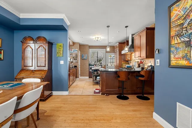 a living room with lots of furniture and windows