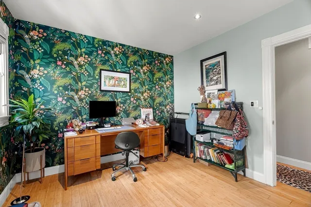 a view of a workspace with furniture and a livingroom