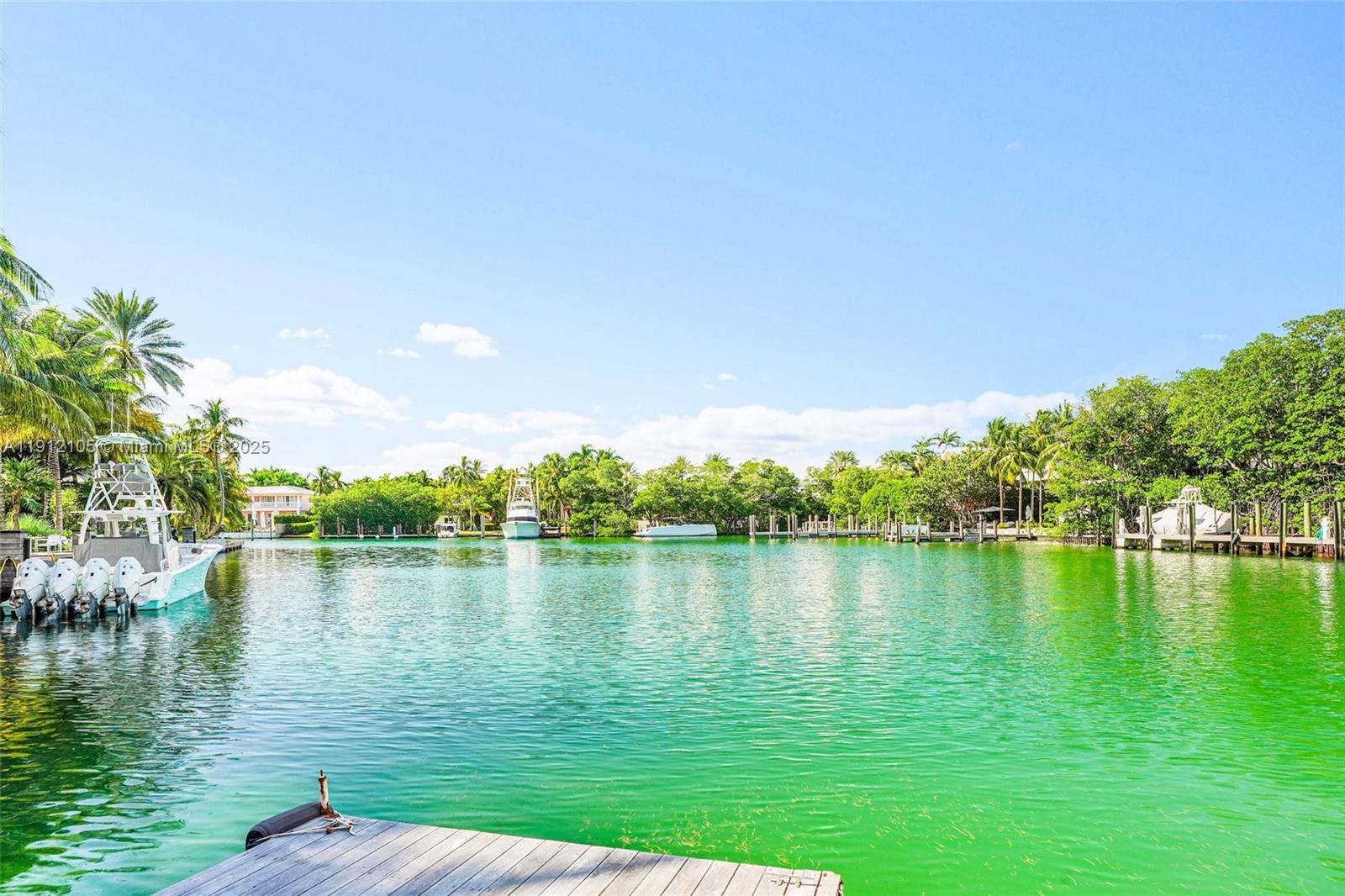 550 Harbor Drive Key Biscayne, FL 33149 - Photo 13 of 65 a view of a lake with houses in the back