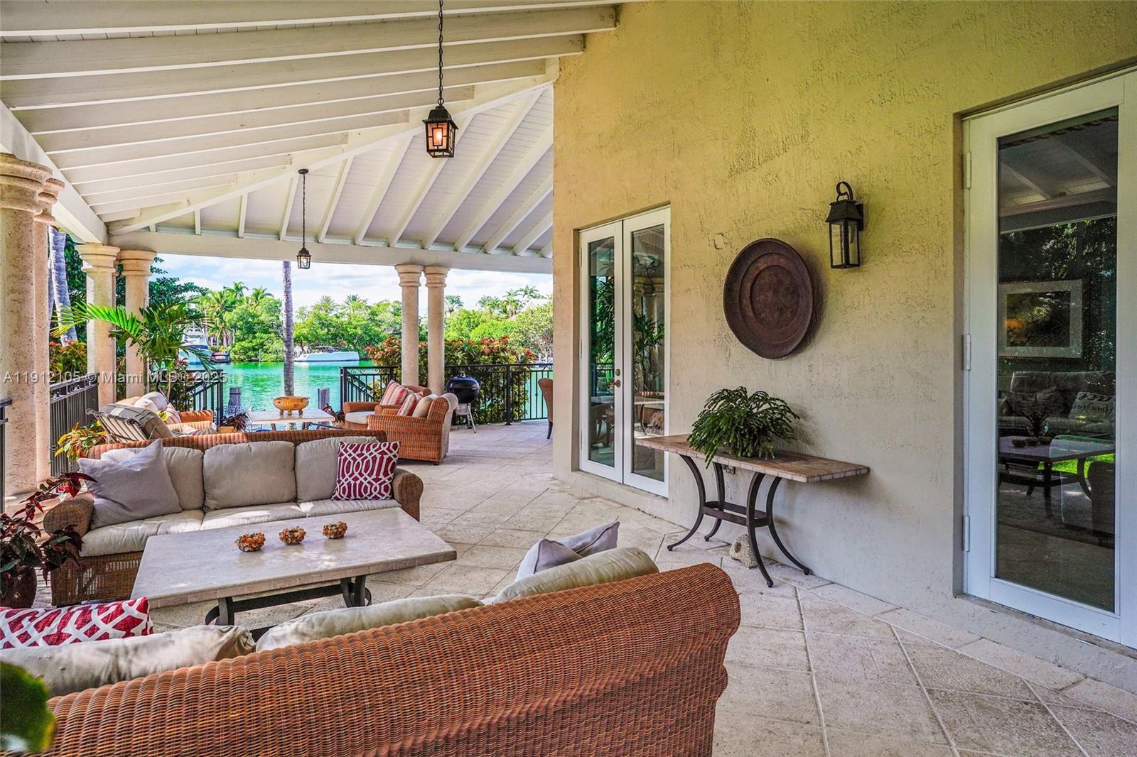 550 Harbor Drive Key Biscayne, FL 33149 - Photo 16 of 65 a living room with furniture a window and a table
