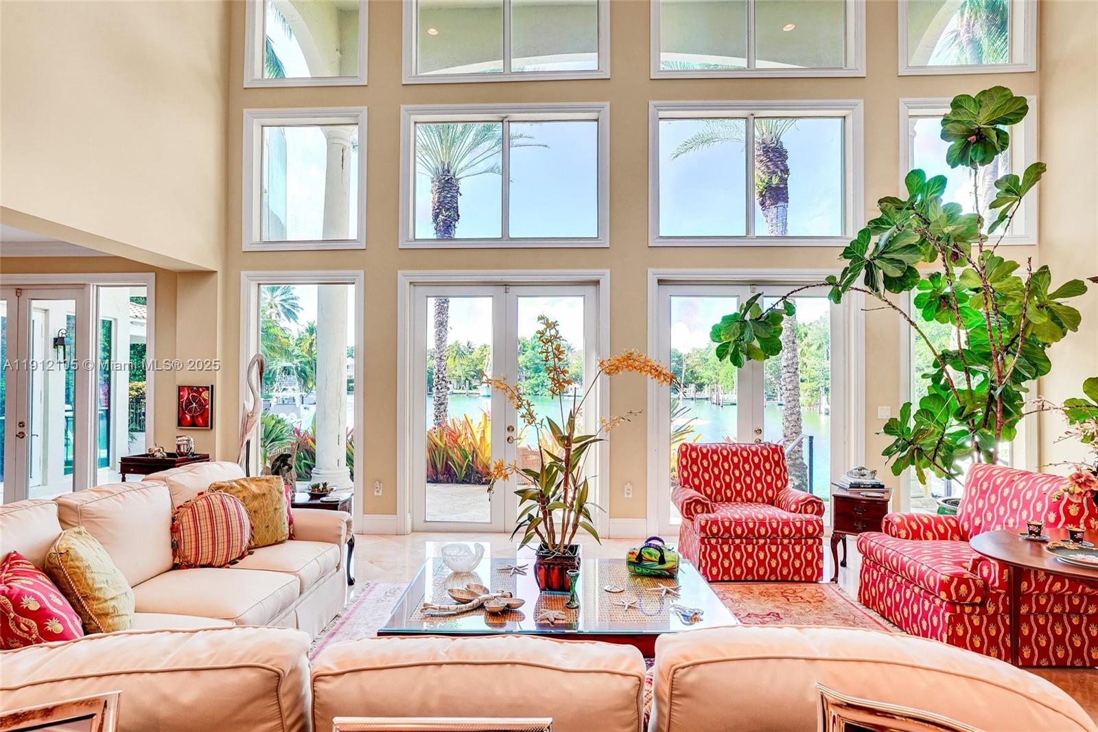 550 Harbor Drive Key Biscayne, FL 33149 - Photo 22 of 65 a living room filled with furniture and a large window