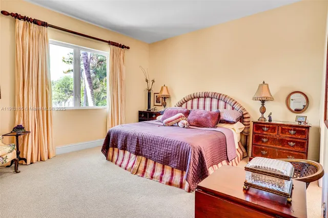 a view of a hallway with a bedroom