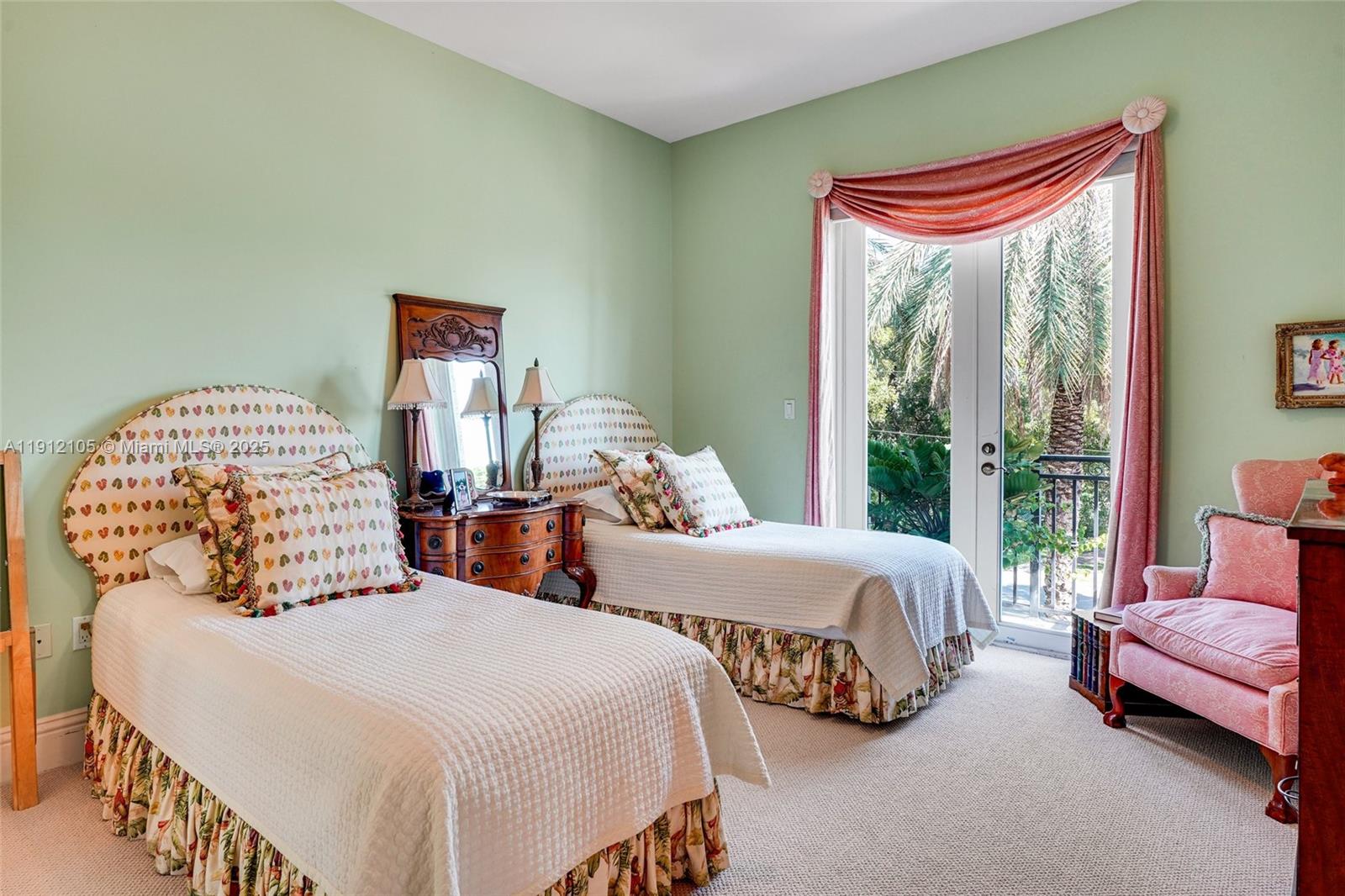 550 Harbor Drive Key Biscayne, FL 33149 - Photo 39 of 65 a bedroom with two beds and a large window