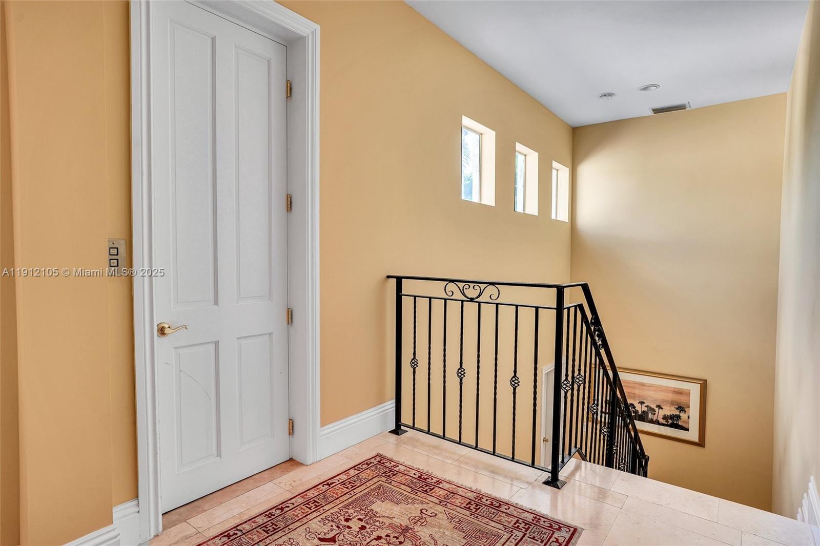 550 Harbor Drive Key Biscayne, FL 33149 - Photo 41 of 65 a view of a hallway with a bedroom