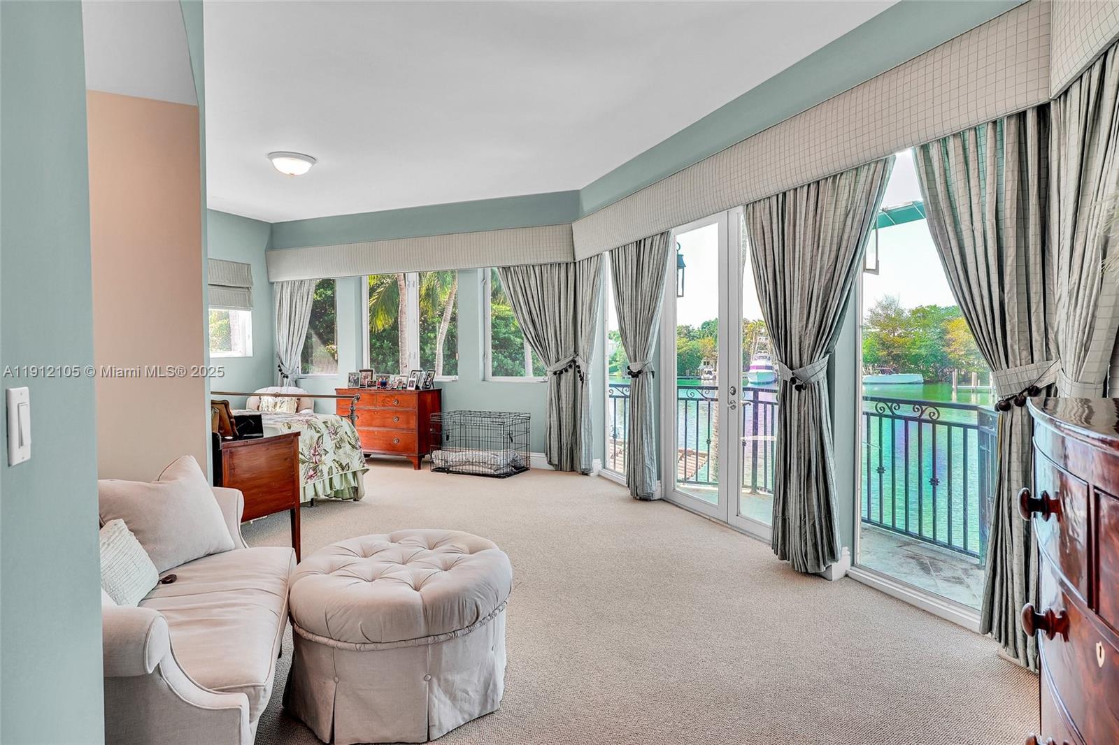 550 Harbor Drive Key Biscayne, FL 33149 - Photo 47 of 65 a living room with furniture and a floor to ceiling window