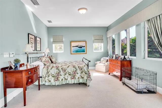 a view of a dining room and hall with furniture