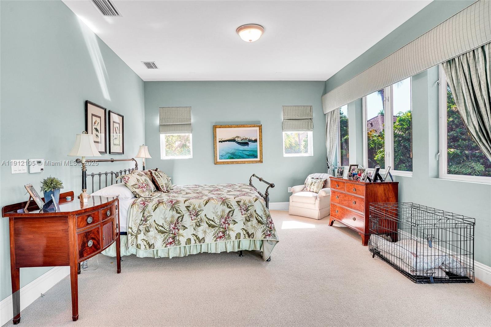 550 Harbor Drive Key Biscayne, FL 33149 - Photo 48 of 65 a bedroom with furniture and large windows