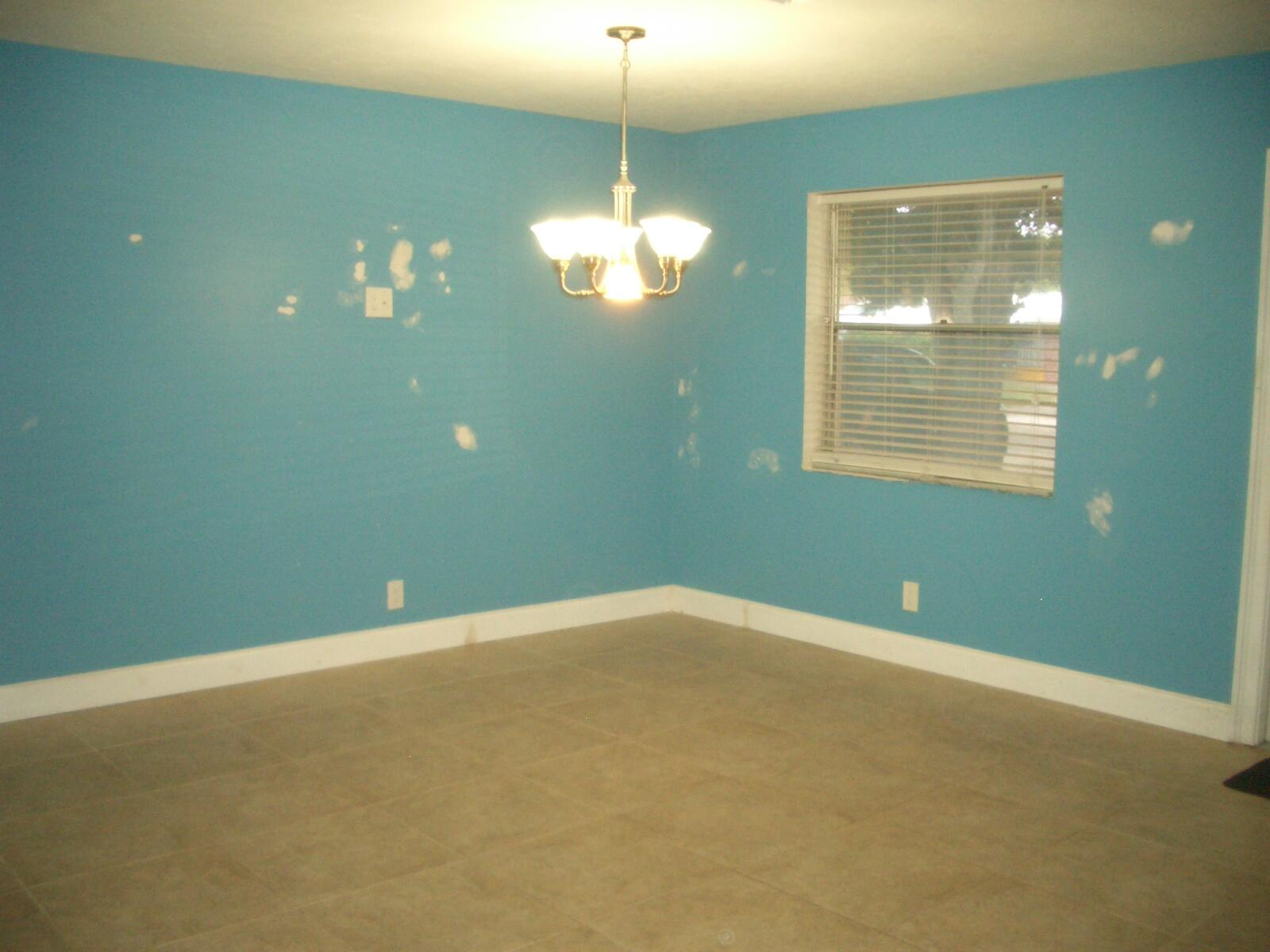 403 Daly Drive Jupiter, FL 33458 - Photo 4 of 27 a view of an empty room with a window
