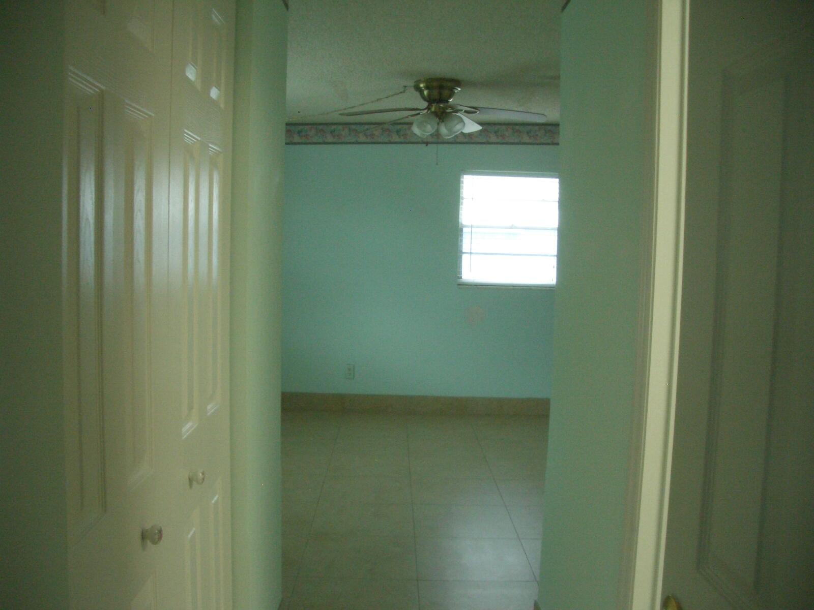 403 Daly Drive Jupiter, FL 33458 - Photo 8 of 27 a bathroom with a window