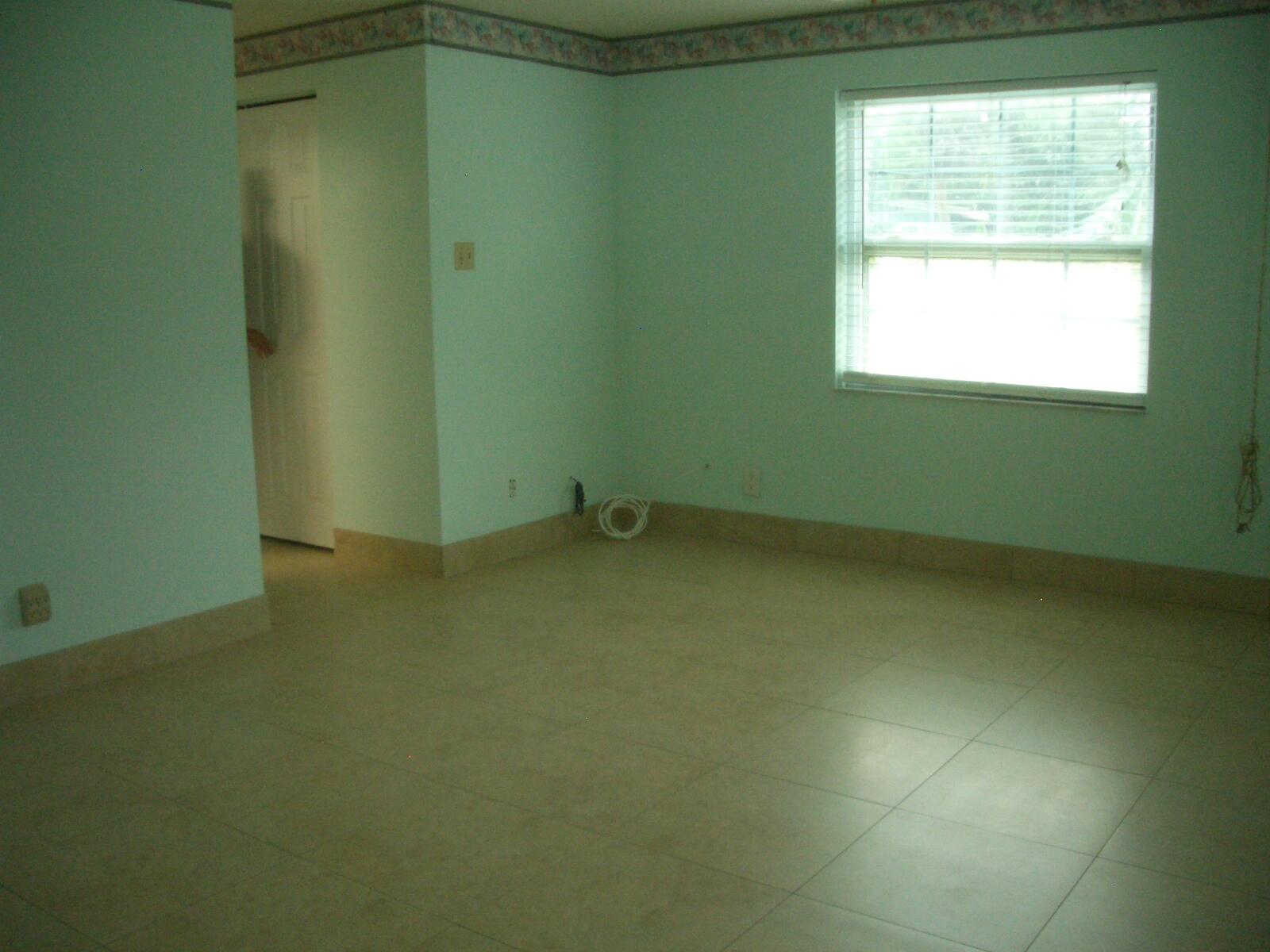 403 Daly Drive Jupiter, FL 33458 - Photo 10 of 27 a room that has a window in it