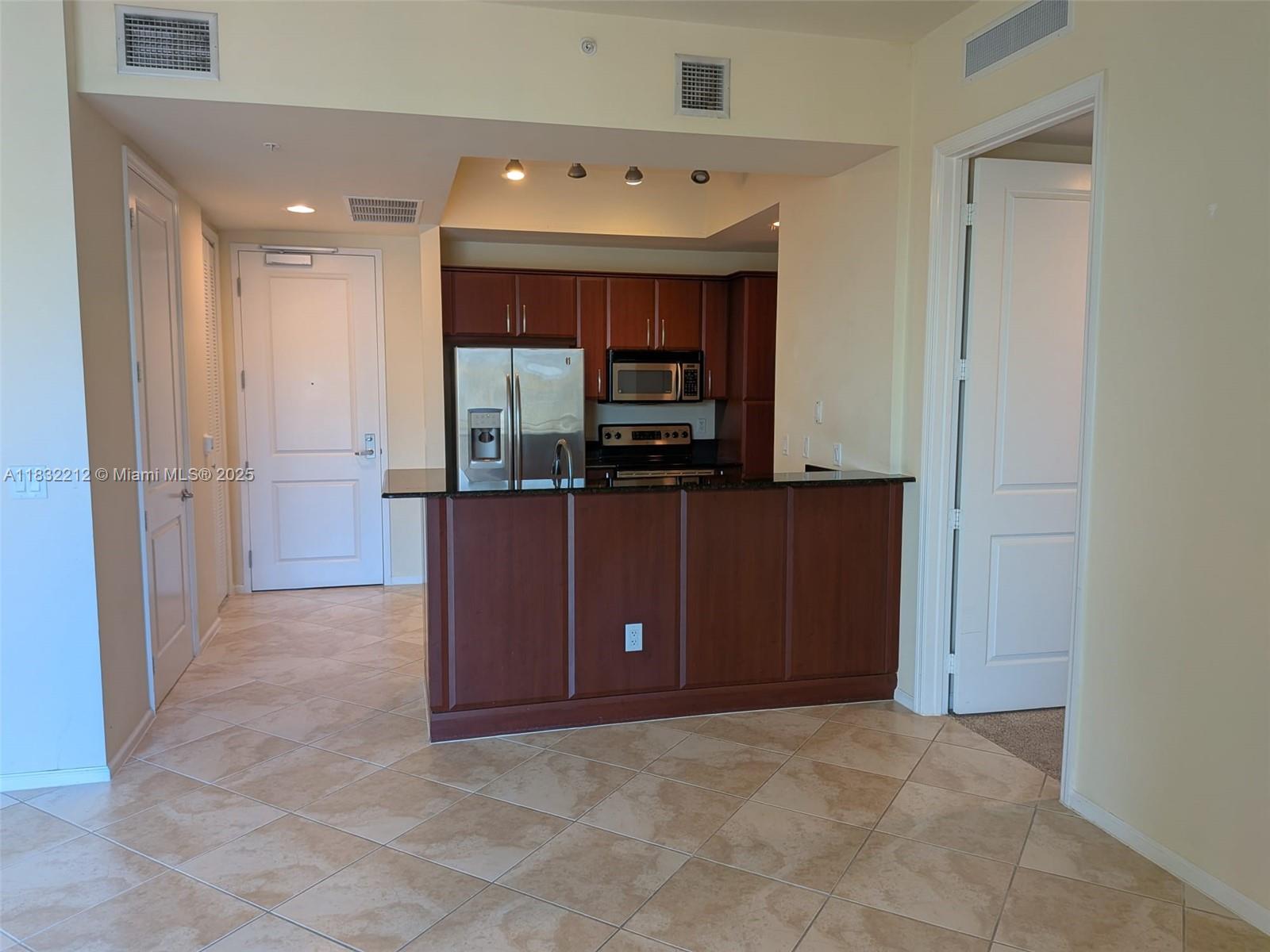 403 South Sapodilla Avenue, Unit 803 West Palm Beach, FL 33401 - Photo 13 of 23 a view of a kitchen