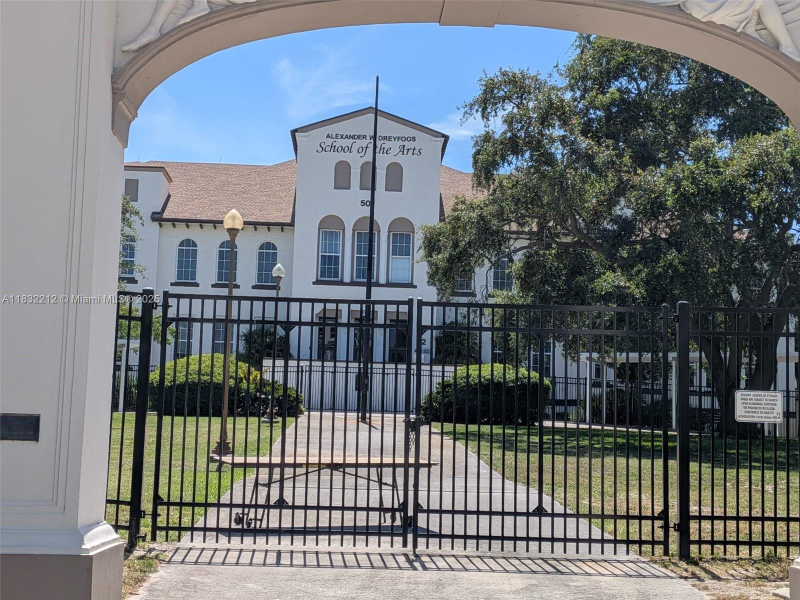 403 South Sapodilla Avenue, Unit 803 West Palm Beach, FL 33401 - Photo 4 of 23 a view of a brick building from a balcony