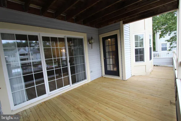 a view of empty room with windows