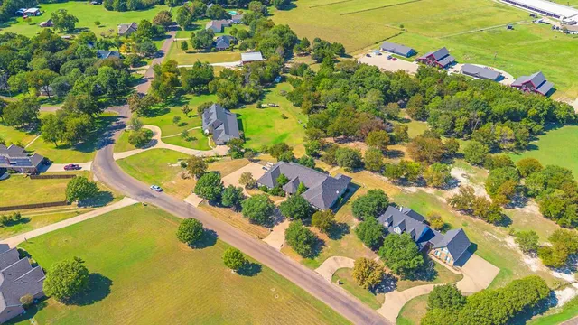 a view of a swimming pool and outdoor seating