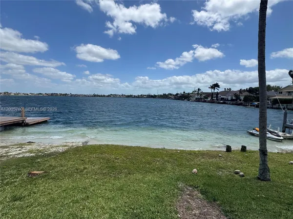 a view of a lake from a yard
