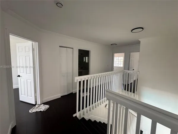 a view of hallway with livingroom