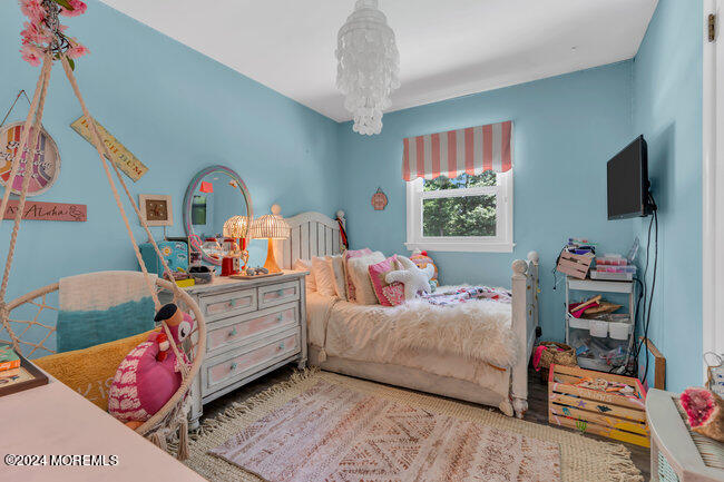 3235 Ridgewood Road Allenwood, NJ 08720 - Photo 11 of 53 a bedroom with furniture and a window