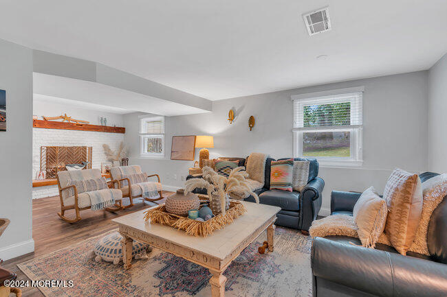 3235 Ridgewood Road Allenwood, NJ 08720 - Photo 17 of 53 a living room with furniture or couch and a window
