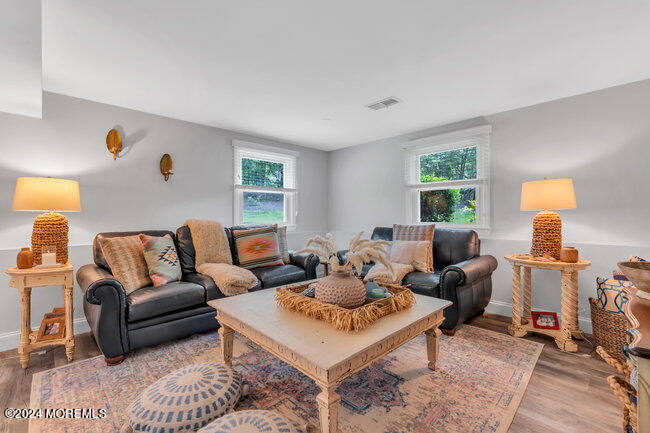 3235 Ridgewood Road Allenwood, NJ 08720 - Photo 20 of 53 a living room with furniture rug and window