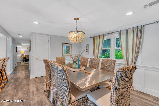 3235 Ridgewood Road Allenwood, NJ 08720 - Photo 22 of 53 a view of a dining room with furniture window and wooden floor