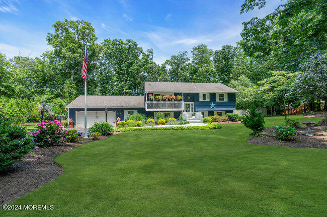 3235 Ridgewood Road Allenwood, NJ 08720 - Photo 3 of 53 a view of a house with a big yard