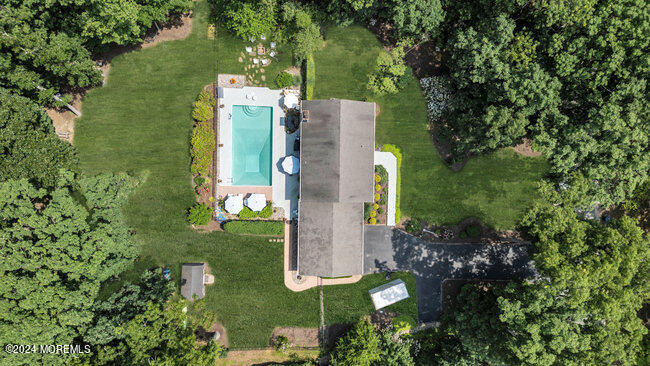 3235 Ridgewood Road Allenwood, NJ 08720 - Photo 50 of 53 an aerial view of a house with a yard basket ball court and outdoor seating