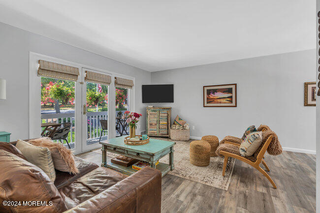 3235 Ridgewood Road Allenwood, NJ 08720 - Photo 5 of 53 a living room with furniture and a flat screen tv