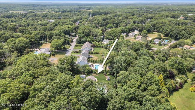 3235 Ridgewood Road Allenwood, NJ 08720 - Photo 52 of 53 an aerial view of residential houses with outdoor space and trees
