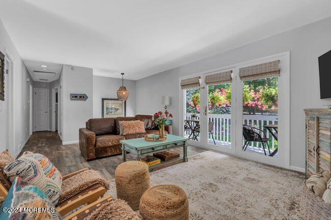 3235 Ridgewood Road Allenwood, NJ 08720 - Photo 6 of 53 a living room with furniture and a large window