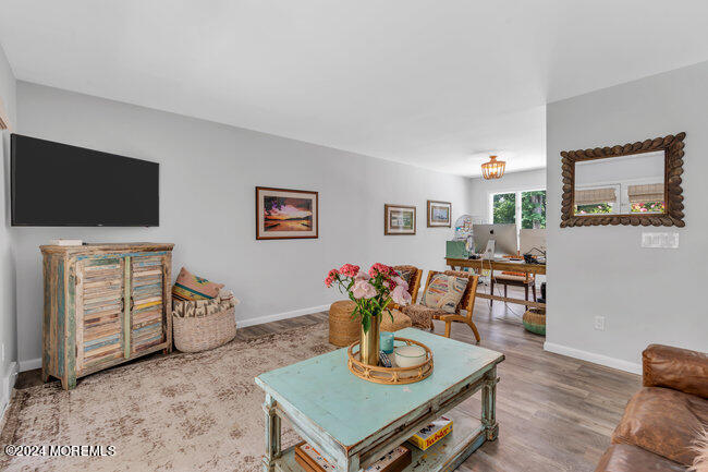 3235 Ridgewood Road Allenwood, NJ 08720 - Photo 8 of 53 a living room with furniture and a flat screen tv