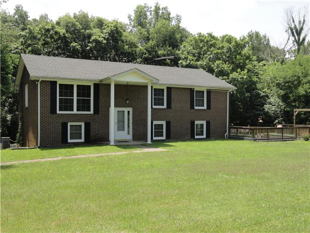 1050 Steel Springs Road Clarksville, TN 37040 - Photo 1 of 20 Wonderful all-brick home nestled on a one acre wooded lot! This home is move-in ready with newer composition shingle roof and 2 year old replacement windows. Lots of space in this home for a large or growing family.