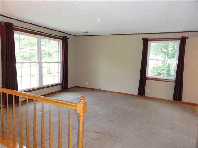 1050 Steel Springs Road Clarksville, TN 37040 - Photo 4 of 20 Large upstairs great room with beautiful windows to bring lots of natural light and enjoyment of the great outdoor views. This room is open to eat-in area of kitchen for easy entertaining.