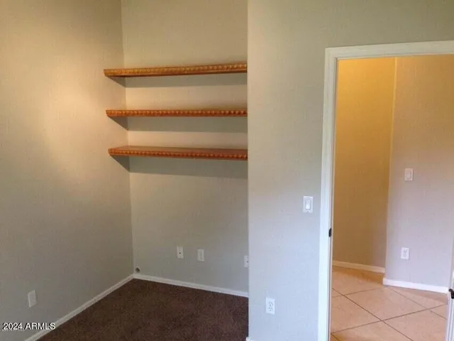 a view of small space with racks on the wall