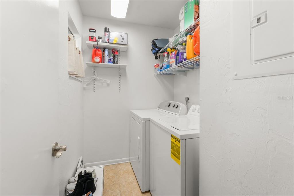 2735 Southwest 35th Place, Unit 903 Gainesville, FL 32608 - Photo 15 of 21 a utility room with dryer and washer