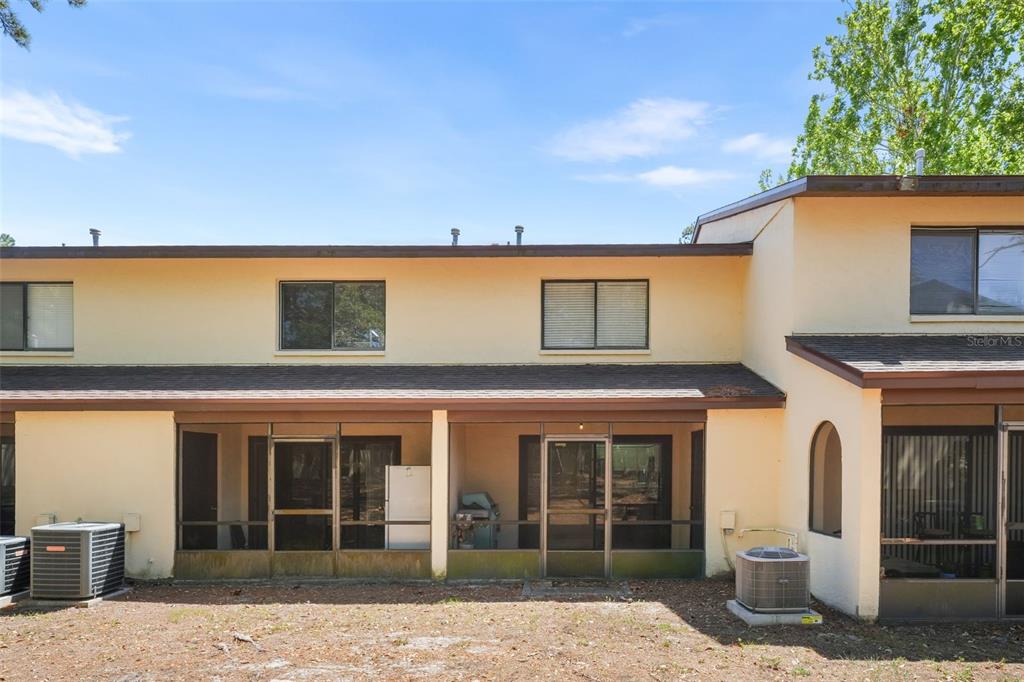 2735 Southwest 35th Place, Unit 903 Gainesville, FL 32608 - Photo 21 of 21 a front view of a house with a yard