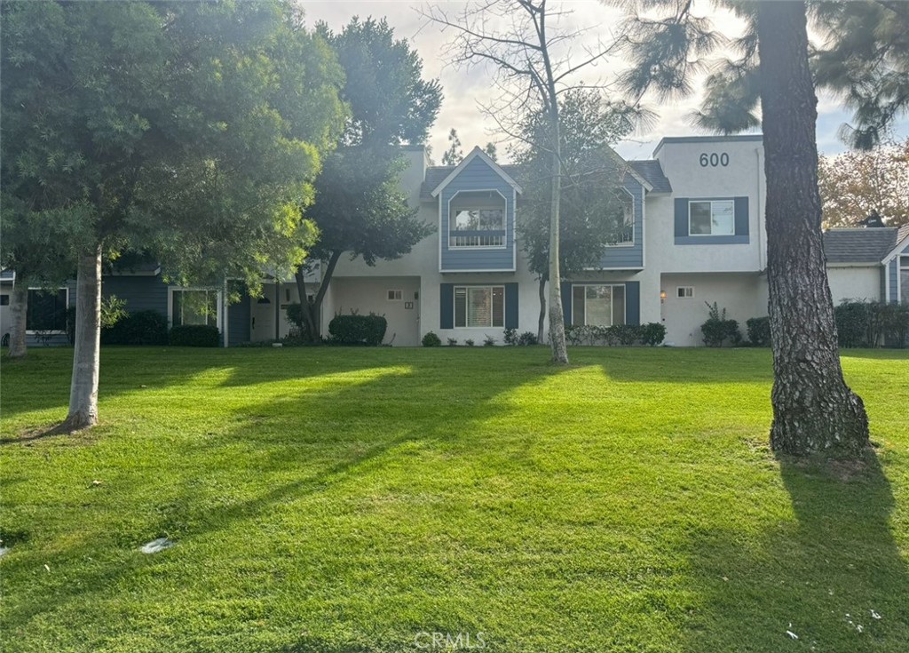 a house with garden in front of it